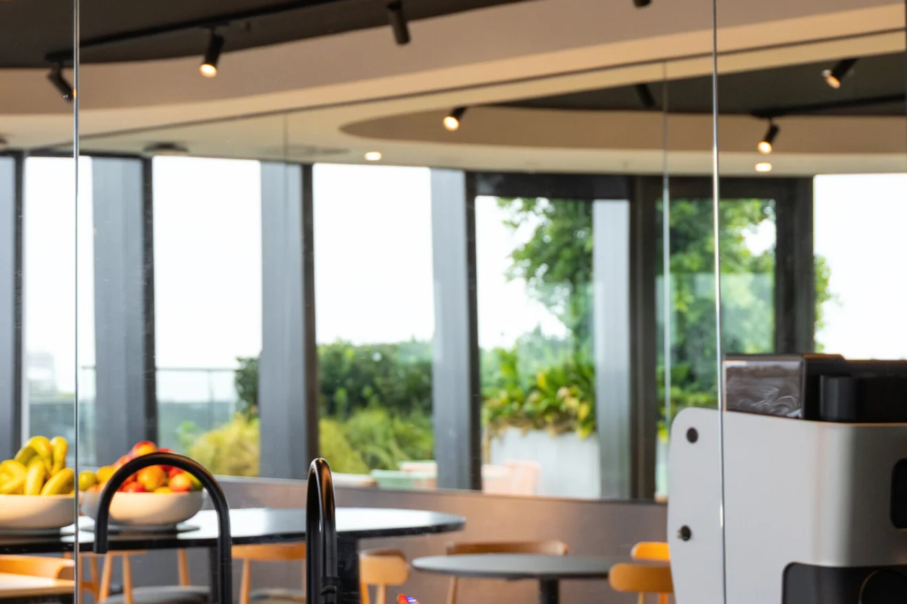 Staff kitchen with track lighting at the Acciona head office in South Melbourne, fitted out by Marlec Electrical