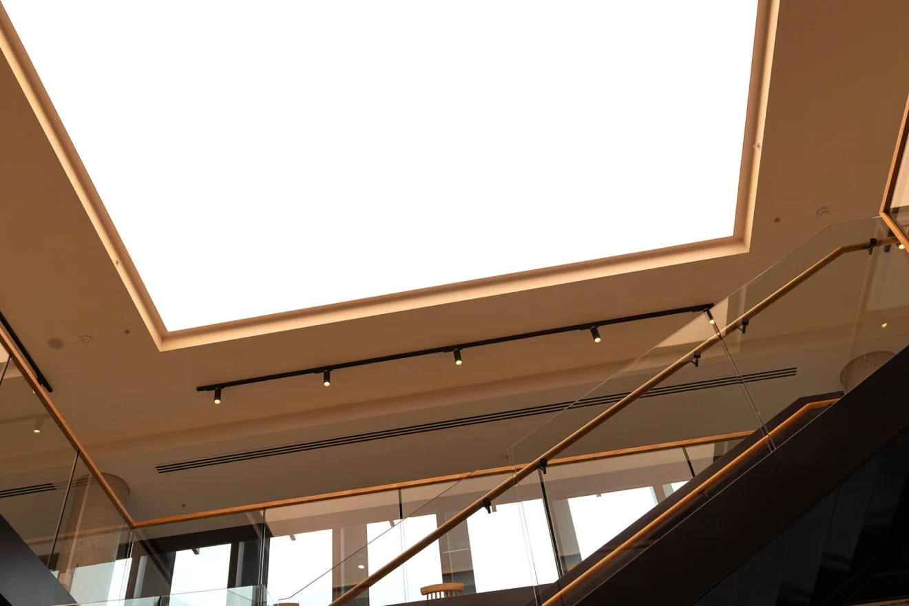 Architectural skylight with integrated lighting at the Acciona head office