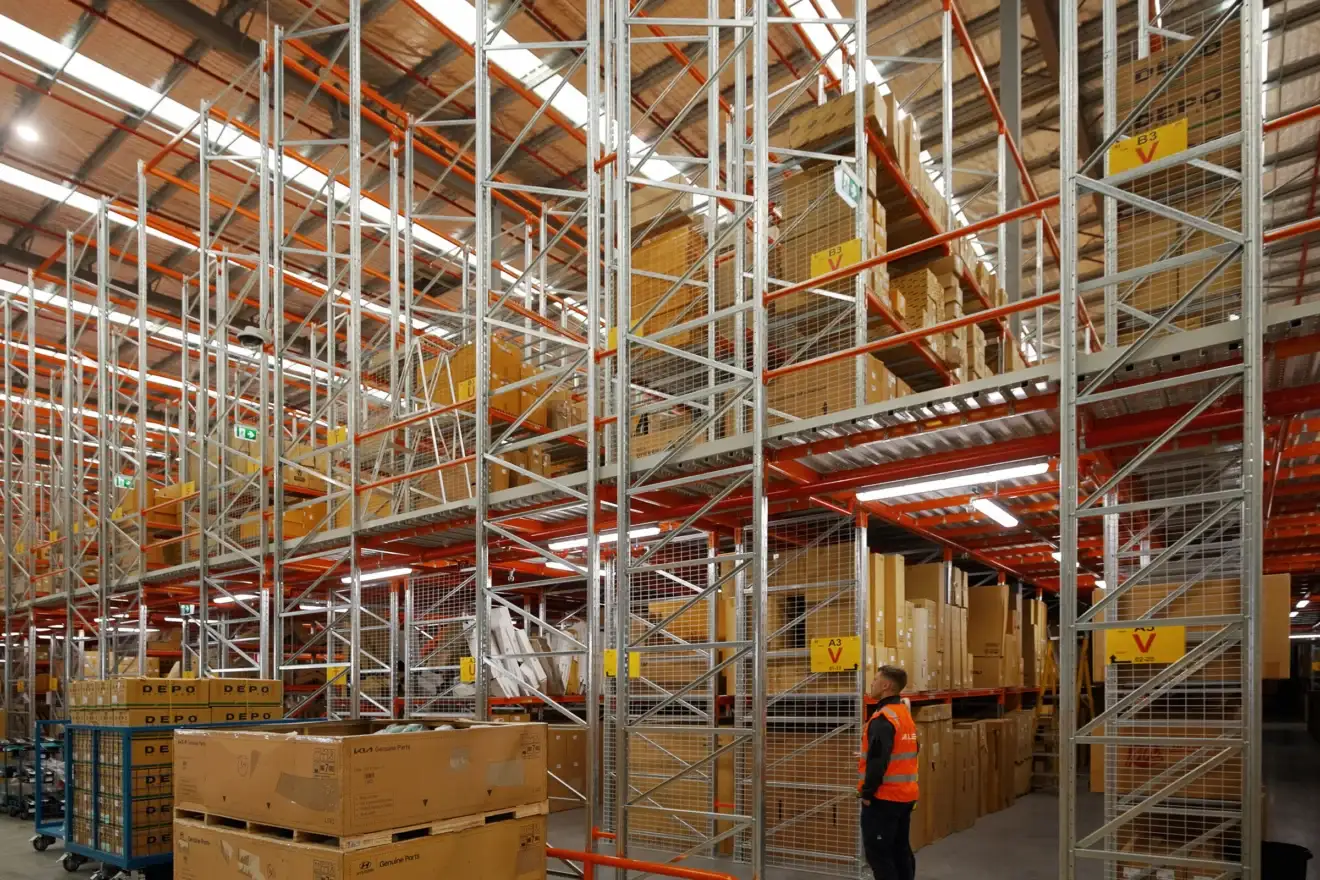 Racking and LED lighting through the Auto Parts Group warehouse in Dandenong, fitted out by Marlec Electrical